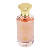 Peach-tinted parfum Olimpica bottle with a luxurious gold cap, Grandeur Elite